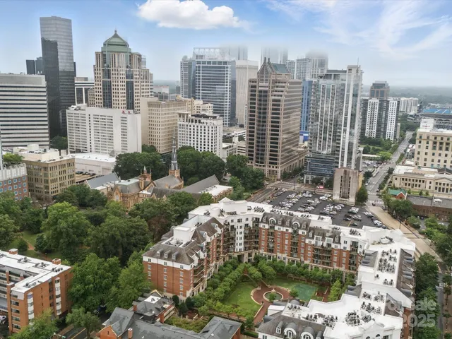a view of a city with tall buildings