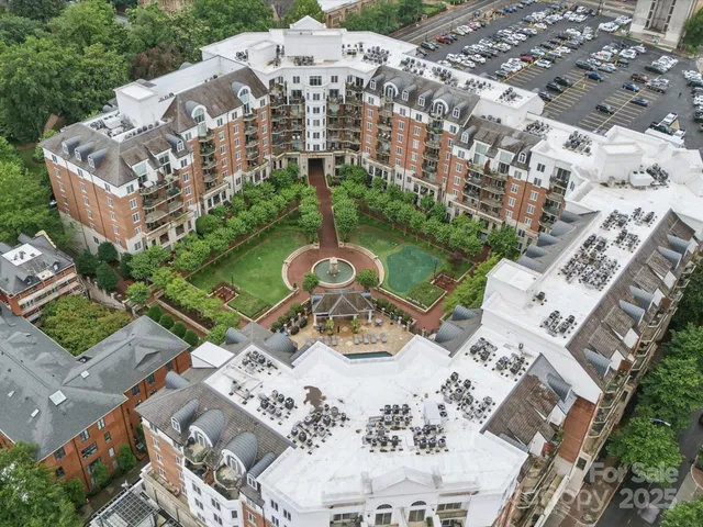 a view of a house with backyard space and garden