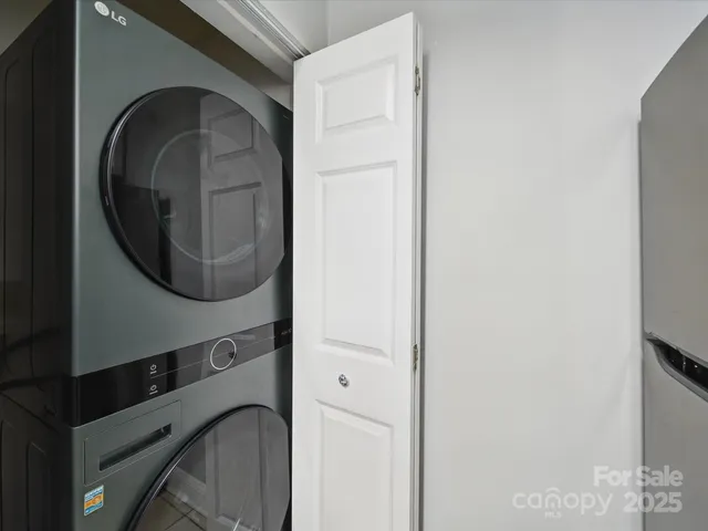 a close view of utility room with washer and dryer