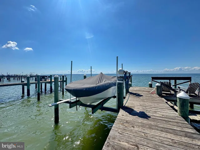 a view of a bathroom with a shower curtain