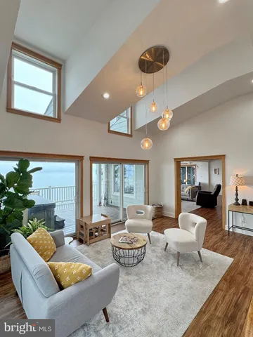 a bedroom with a bed and a table