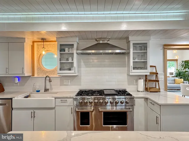 a bedroom with a bed and cabinets