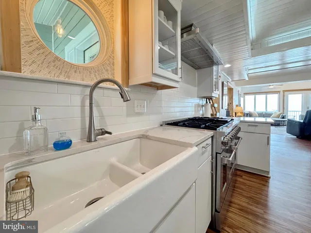 a bedroom with a bed and a table in it