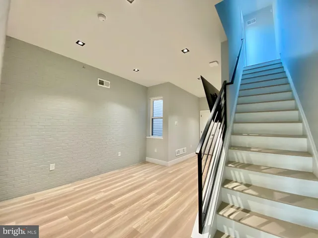 a front view of a multi story residential apartment building