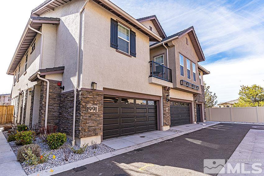 1991 Wind Ranch Road, Unit C Reno, NV 89521 - Photo 1 of 13 a front view of a house