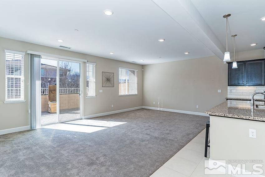 1991 Wind Ranch Road, Unit C Reno, NV 89521 - Photo 6 of 13 a view of a kitchen and a window