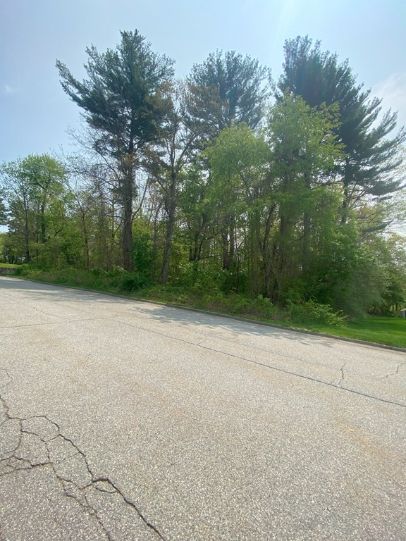 0 Camelot Circle Dudley, MA 01571 - Photo 2 of 6 a view of a backyard