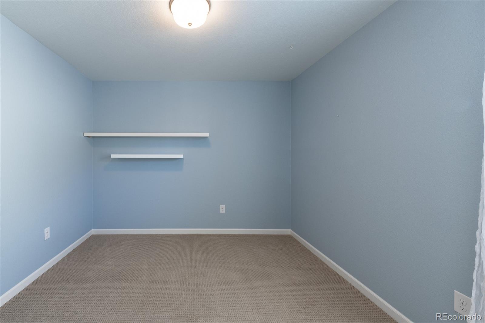 2589 South Kilmer Street Lakewood, CO 80228 - Photo 26 of 40 a view of an empty room