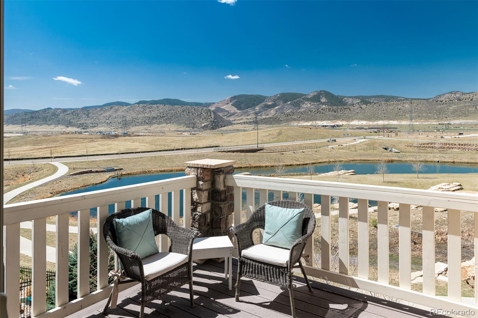 2589 South Kilmer Street Lakewood, CO 80228 - Photo 9 of 40 a view of a chairs and table on the terrace