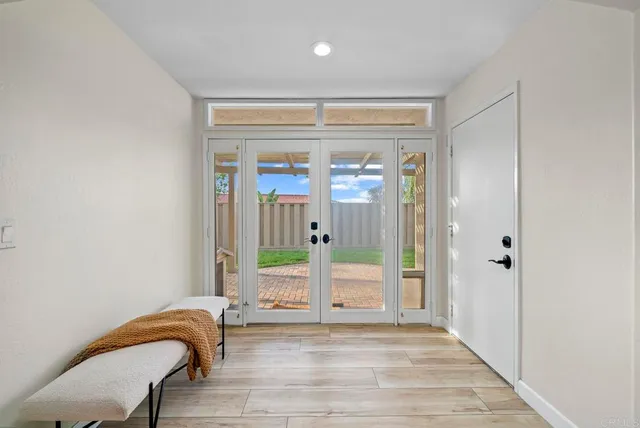 a view of a chairs and table in the patio