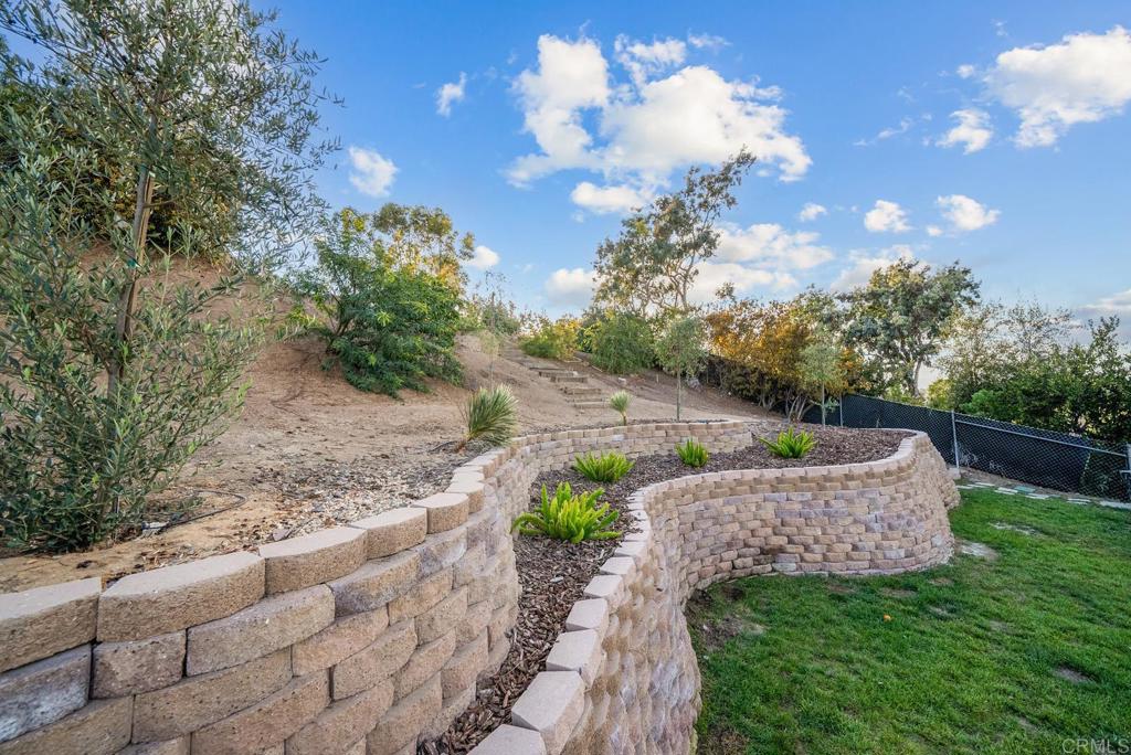 4120 Country Trails Lane Bonita, CA 91902 - Photo 21 of 26 a view of a backyard with brick wall