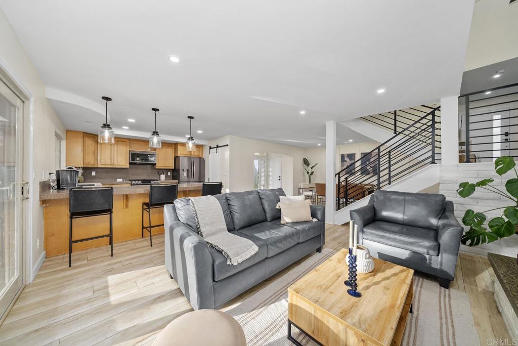 4120 Country Trails Lane Bonita, CA 91902 - Photo 3 of 26 a living room with furniture and kitchen view