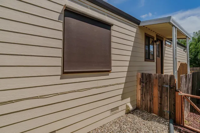 a house view with a backyard space