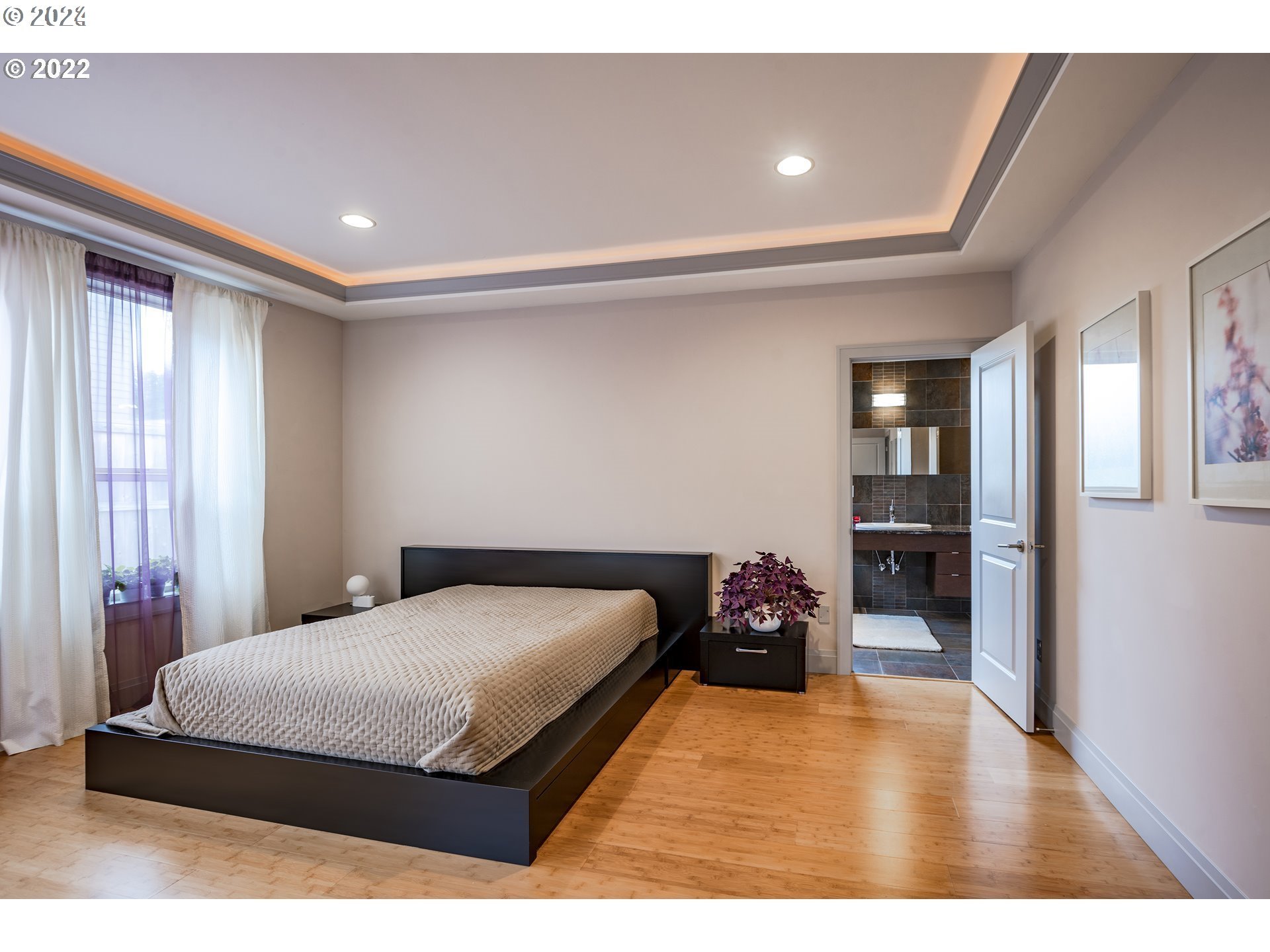 3516 Northeast Ione Street Camas, WA 98607 - Photo 20 of 29 a bedroom with a bed and wooden floor