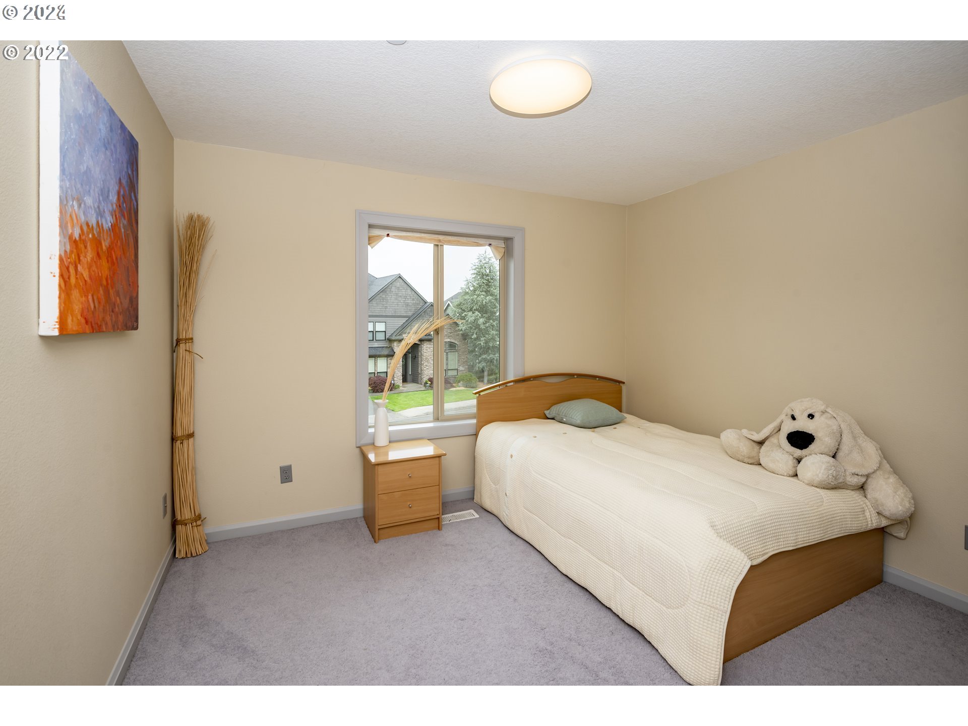 3516 Northeast Ione Street Camas, WA 98607 - Photo 23 of 29 a bedroom with a bed and wooden floor