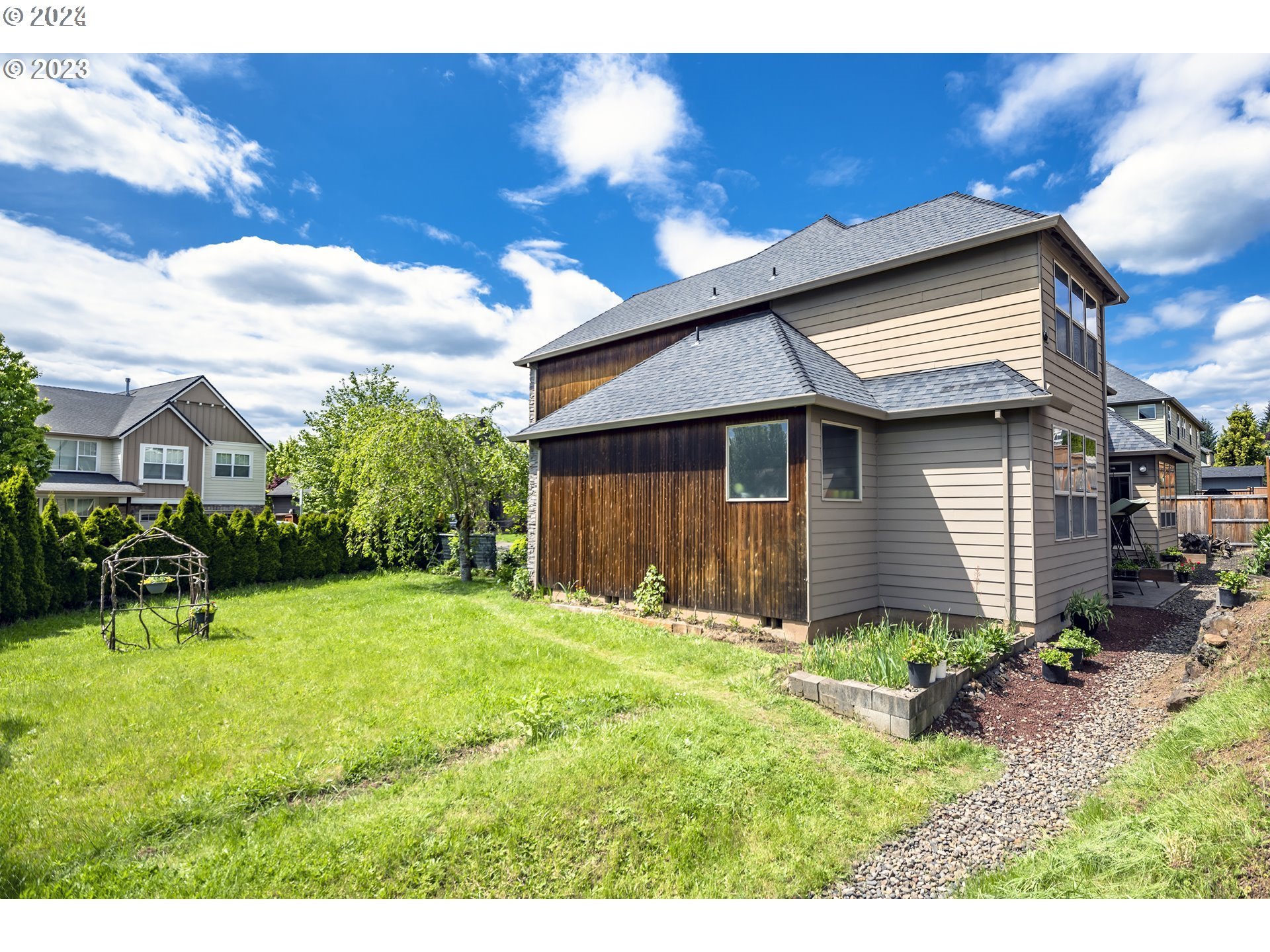 3516 Northeast Ione Street Camas, WA 98607 - Photo 27 of 29 a front view of a house with garden