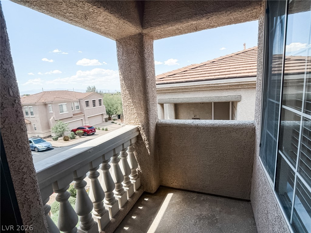 228 Positive Point Street Henderson, NV 89012 - Photo 16 of 27 Enjoy outdoor living on this private balcony, perfect for morning coffee or evening relaxation.
