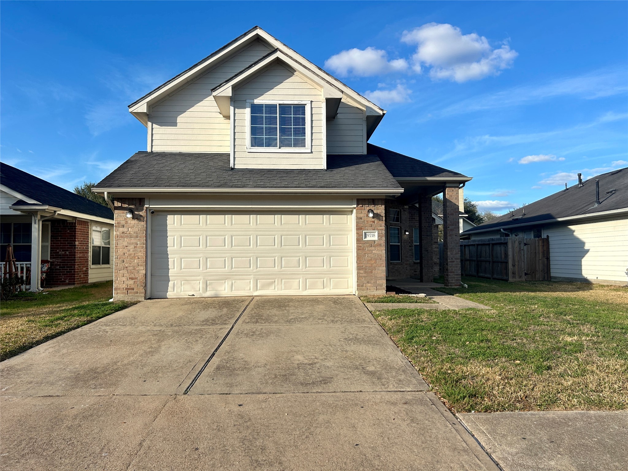 19718 River Pointe Lane Katy, TX 77449 - Photo 2 of 36 a front view of a house with a yard and garage