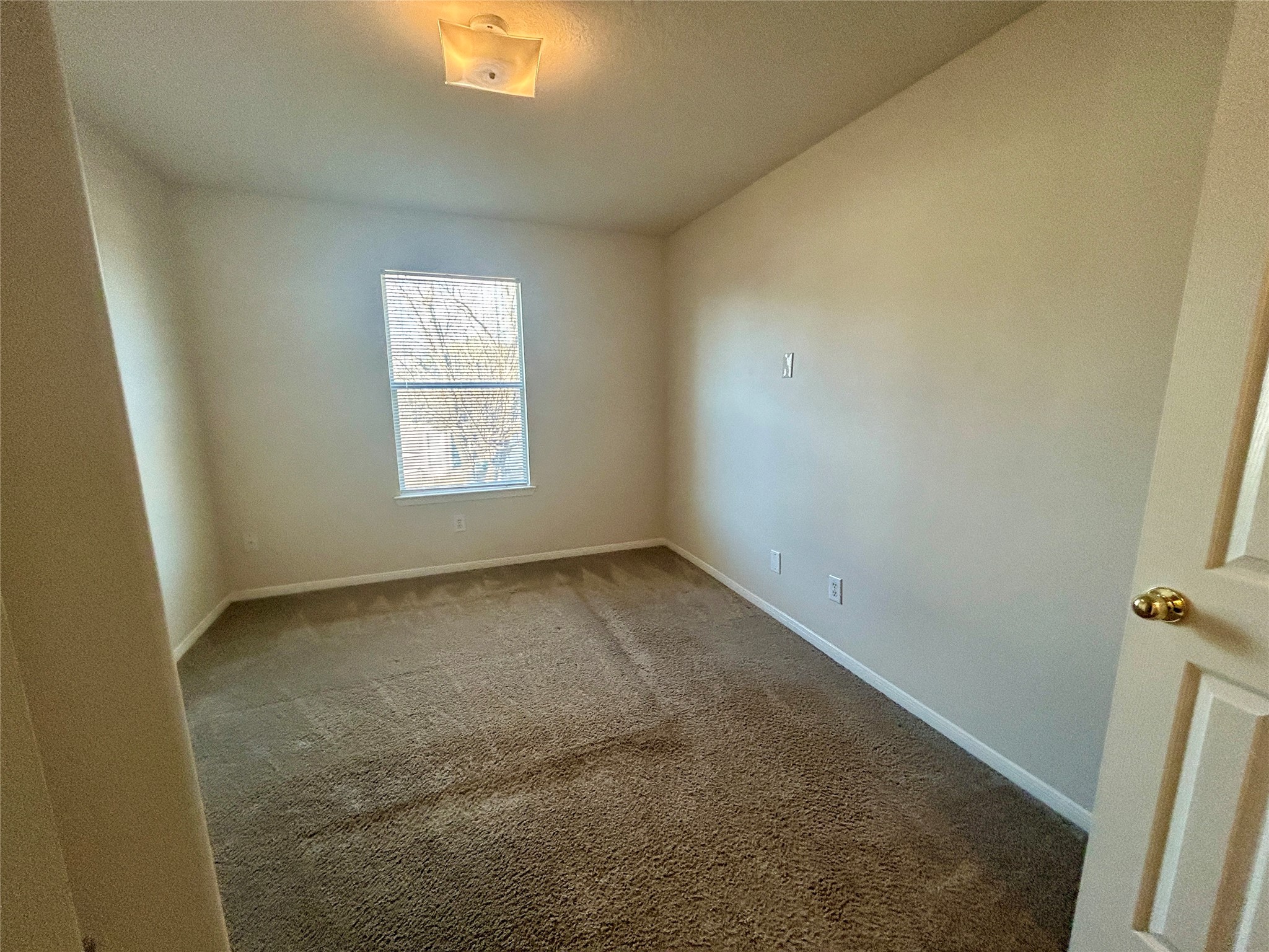 19718 River Pointe Lane Katy, TX 77449 - Photo 30 of 36 an empty room with windows