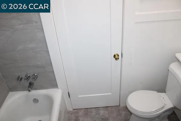 a bathroom with a sink and toilet