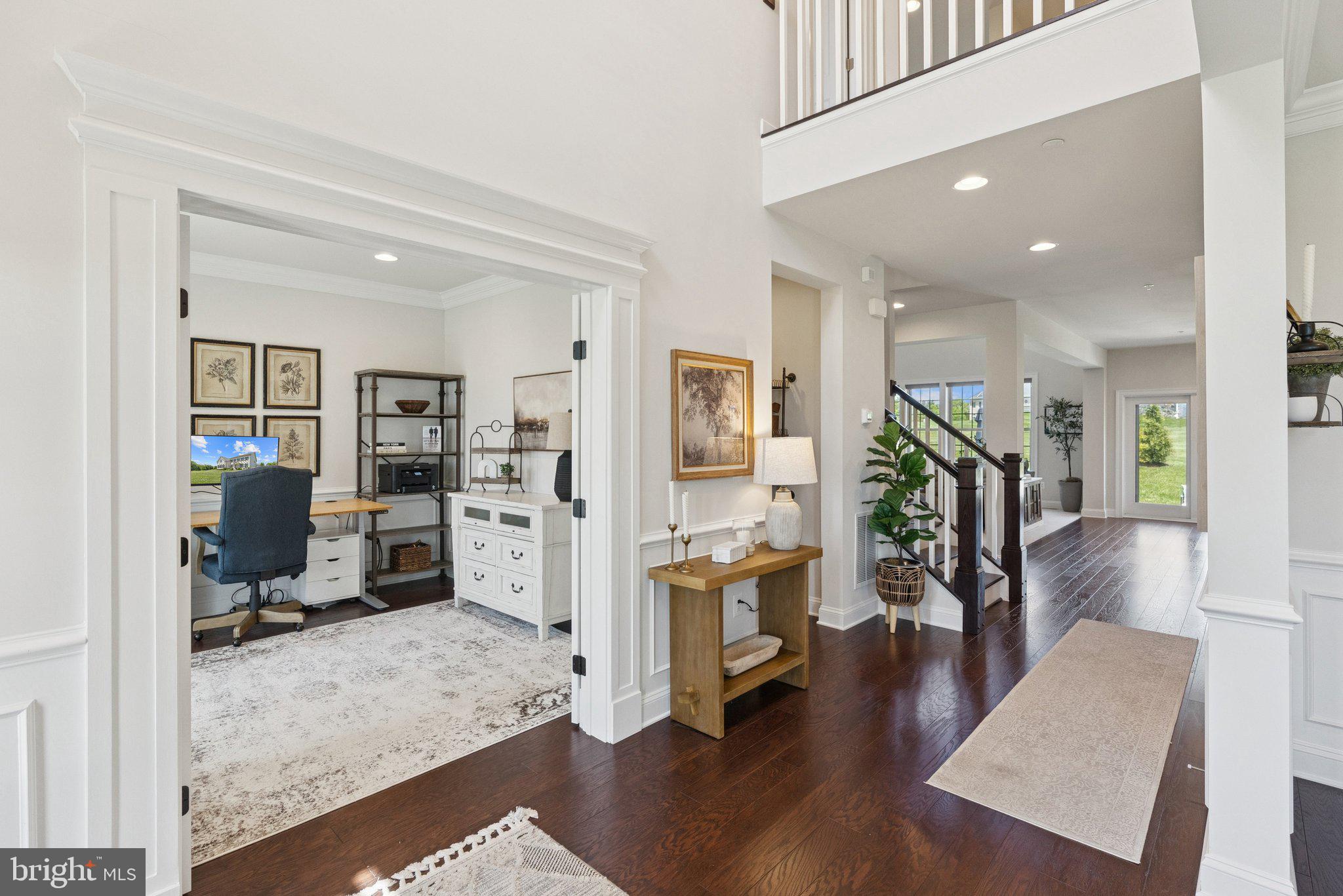 237 Barberry Lane Laytonsville, MD 20882 - Photo 20 of 70 a living room with furniture and a wooden floor