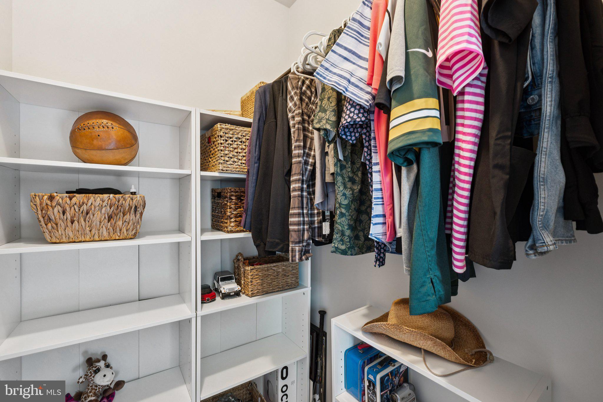 237 Barberry Lane Laytonsville, MD 20882 - Photo 38 of 70 a view of walk in closet with clothes and shoes
