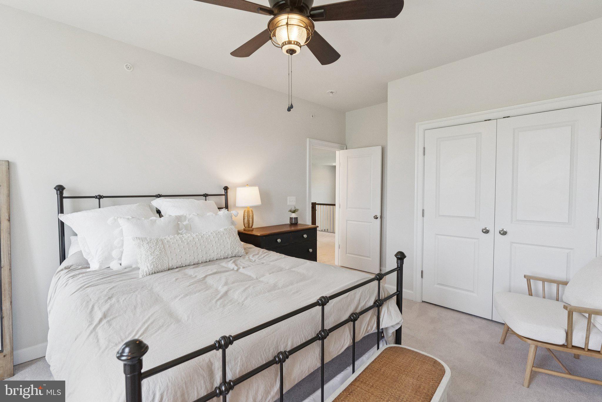 237 Barberry Lane Laytonsville, MD 20882 - Photo 40 of 70 a bedroom with a bed and ceiling fan