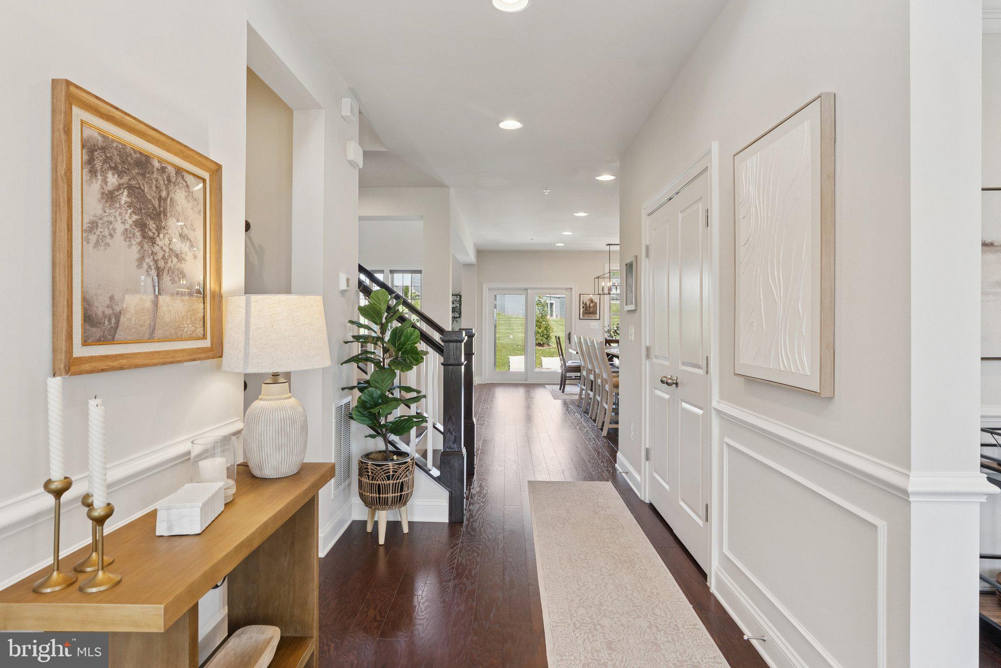 237 Barberry Lane Laytonsville, MD 20882 - Photo 53 of 70 a hallway with wooden floor and furniture