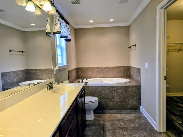 a view of a deck with table and chairs and wooden floor