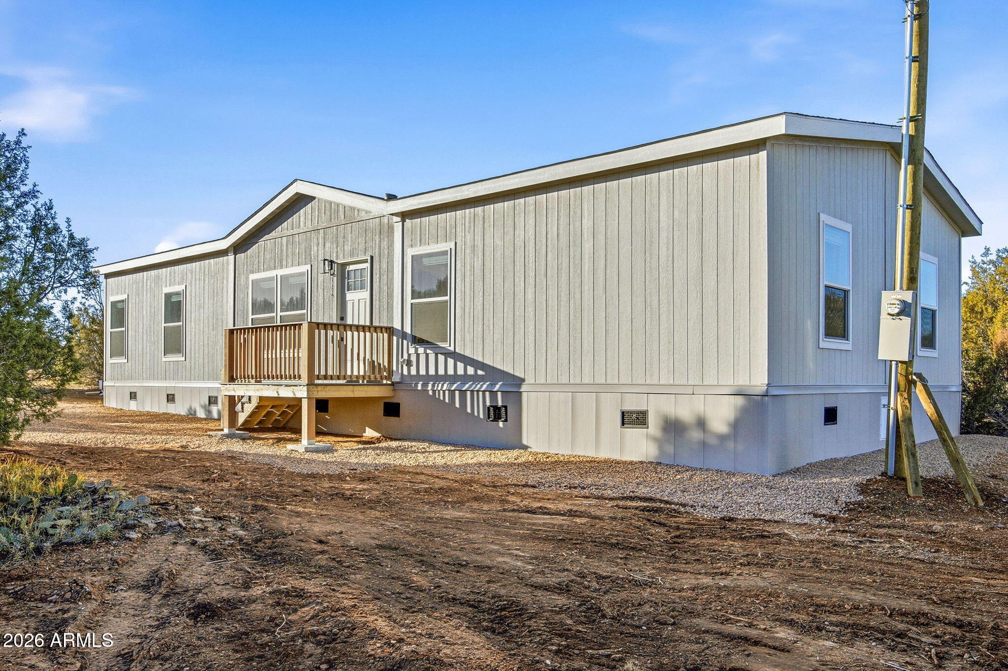2146 Copper Road Clay Springs, AZ 85923 - Photo 1 of 30 a view of a house with a yard