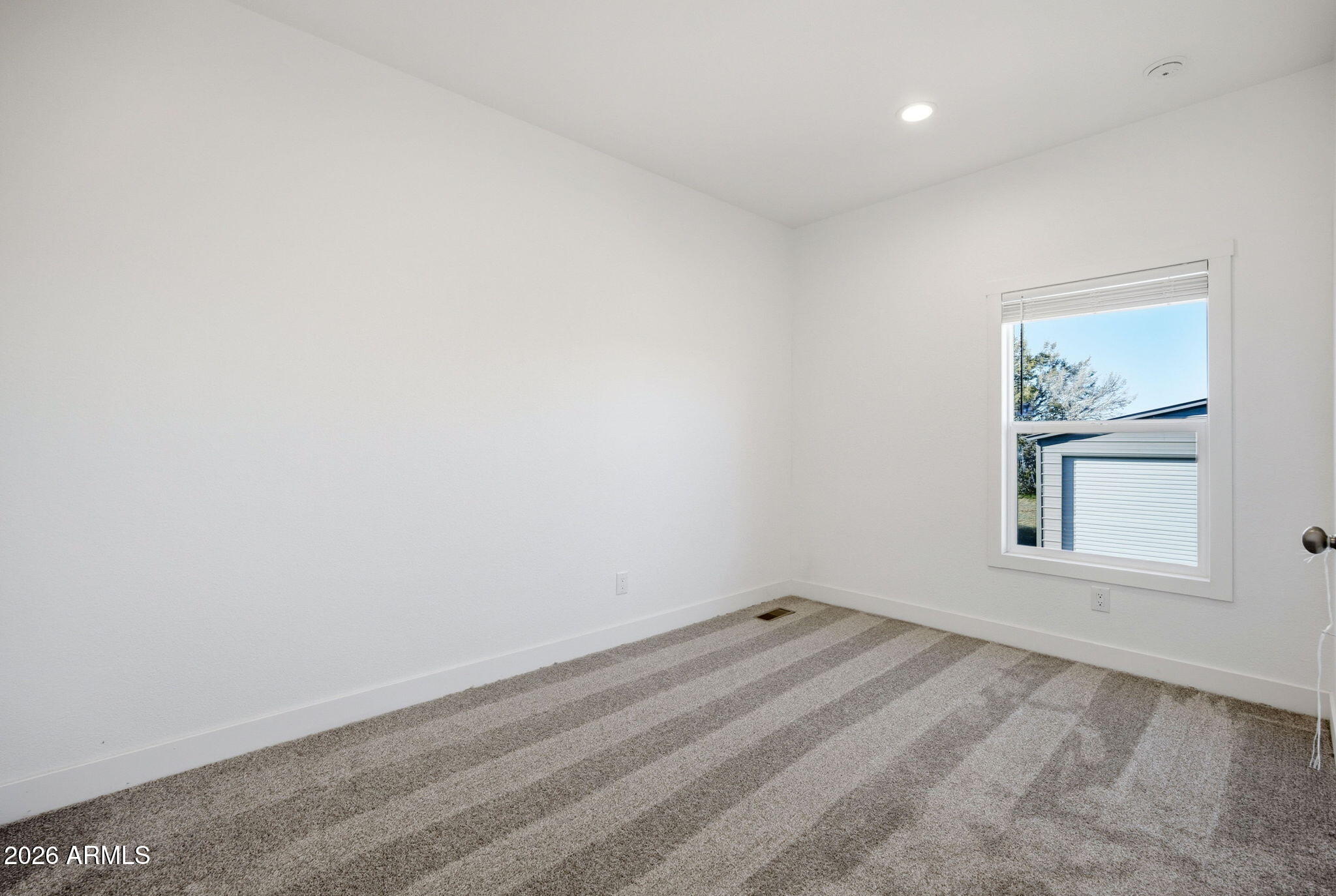 2146 Copper Road Clay Springs, AZ 85923 - Photo 19 of 30 an empty room with a window