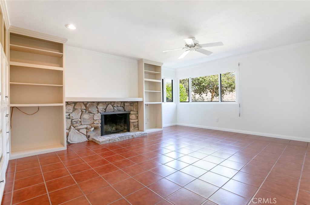 9071 Riderwood Drive Sunland, CA 91040 - Photo 12 of 46 a view of a livingroom with a fireplace and window