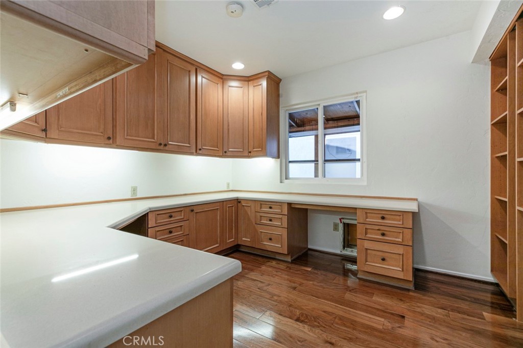 9071 Riderwood Drive Sunland, CA 91040 - Photo 17 of 46 a kitchen with wooden cabinets and a stove
