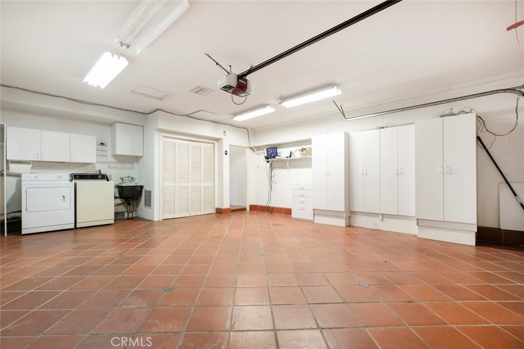 9071 Riderwood Drive Sunland, CA 91040 - Photo 44 of 46 a view of an empty room with kitchen and a window