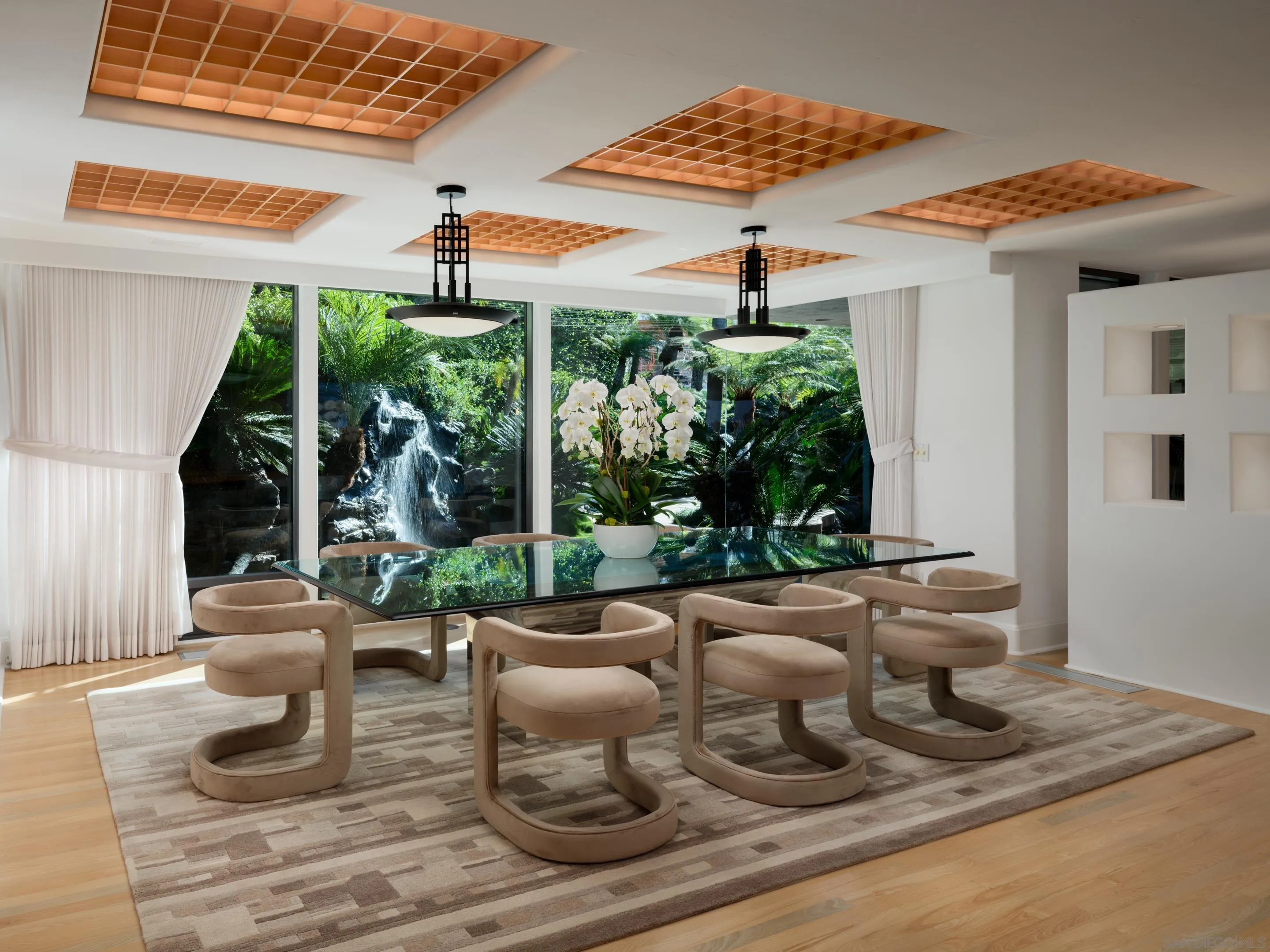 8633 Ruette Monte Carlo La Jolla, CA 92037 - Photo 16 of 48 a view of a patio with table and chairs potted plants and floor to ceiling window