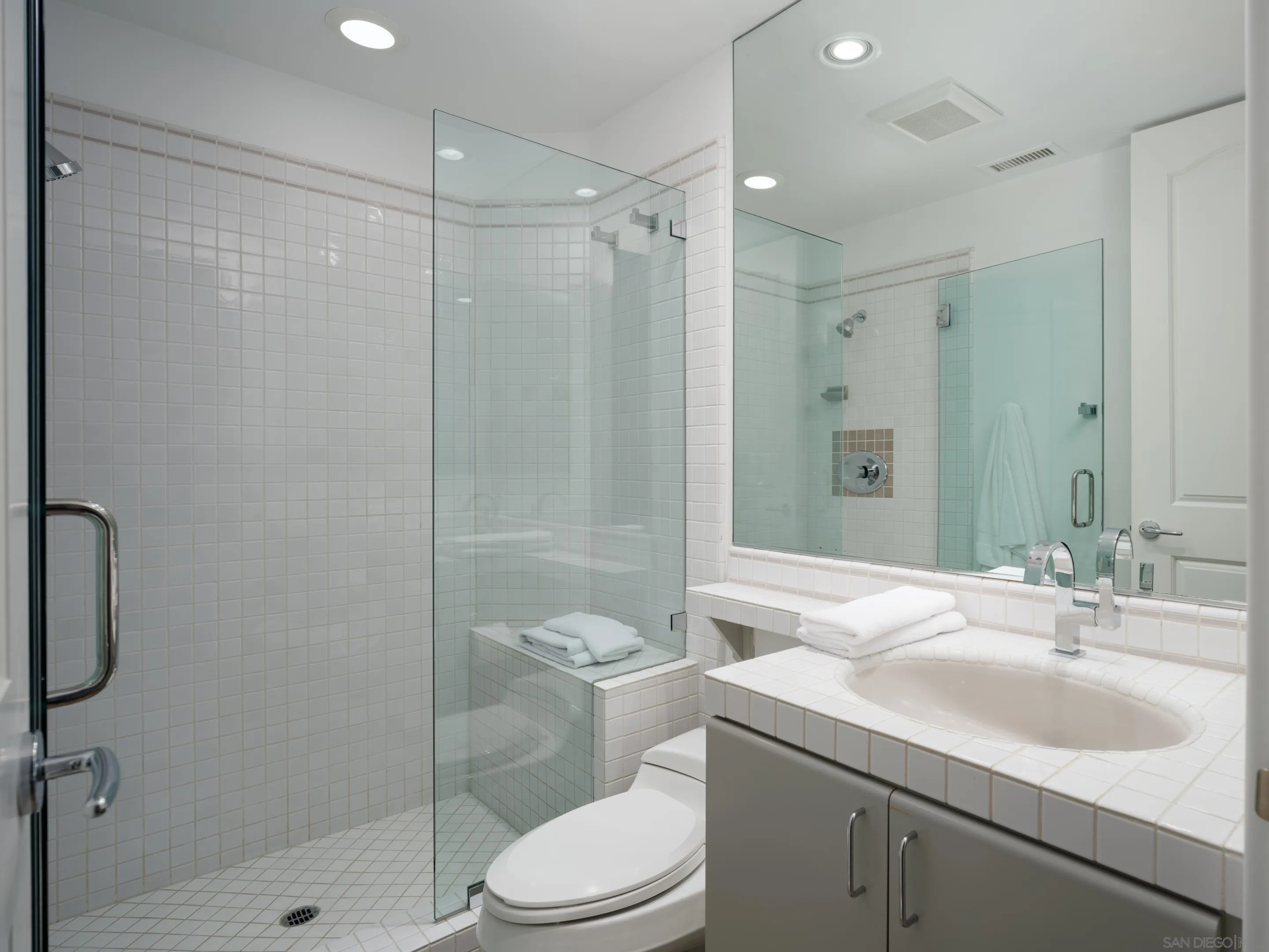 8633 Ruette Monte Carlo La Jolla, CA 92037 - Photo 42 of 48 a bathroom with a sink toilet and shower