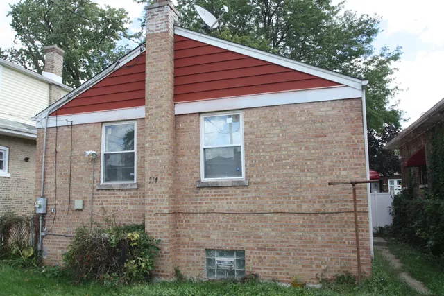 a backyard of a house with lots of green space