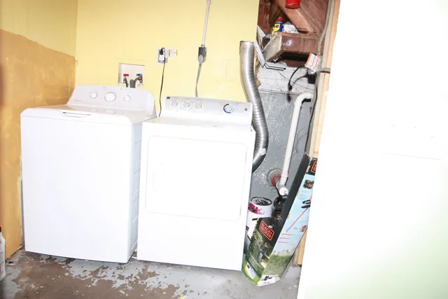 a view of hallway with wooden floor