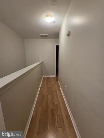 a view of hallway with stairs