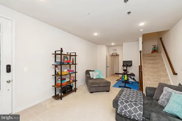 a living room with furniture and a couch