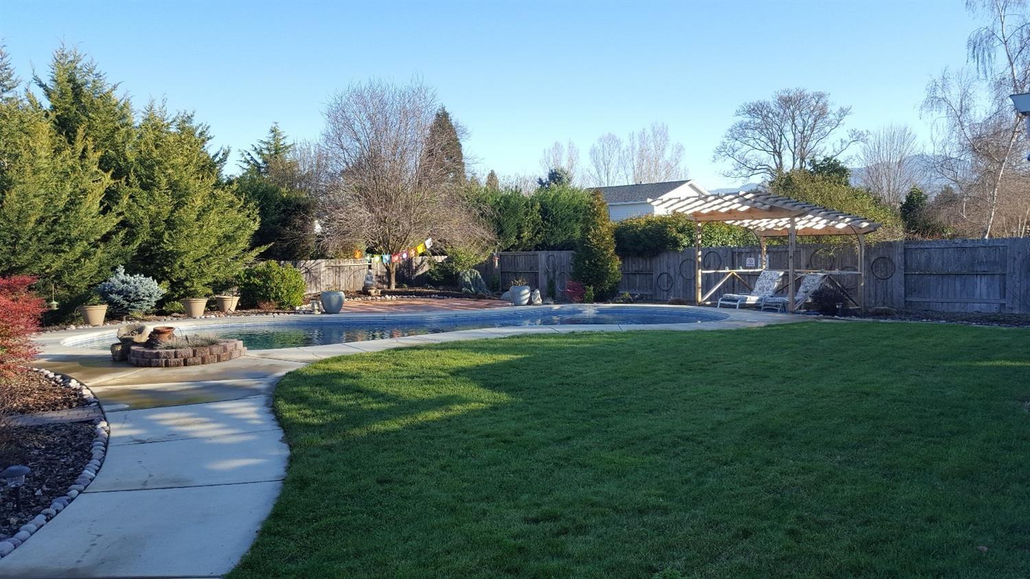 3813 Hilsinger Road Phoenix, OR 97535 - Photo 31 of 35 a view of a park with swings and slides
