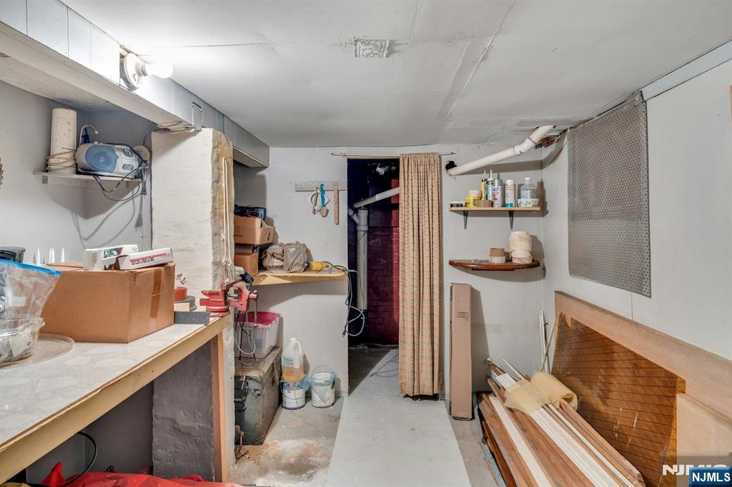 79 Washington Street Harrison, NJ 07029 - Photo 19 of 25 a room with storage and utility