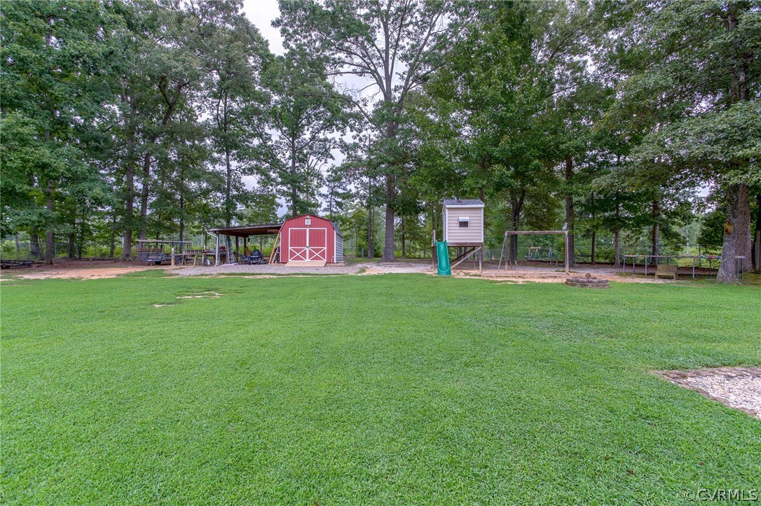 11406 Corte Castle Road Chesterfield, VA 23838 - Photo 13 of 38 a view of a park with swings and slides