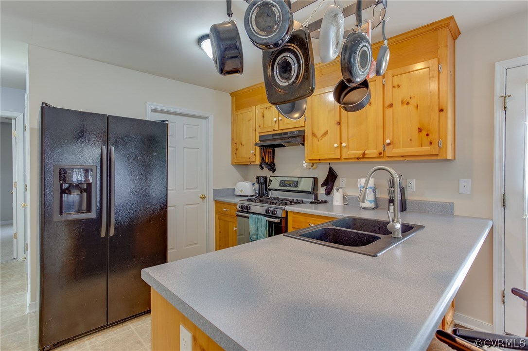 11406 Corte Castle Road Chesterfield, VA 23838 - Photo 25 of 38 a kitchen with stainless steel appliances granite countertop a sink a stove a refrigerator and dishwasher