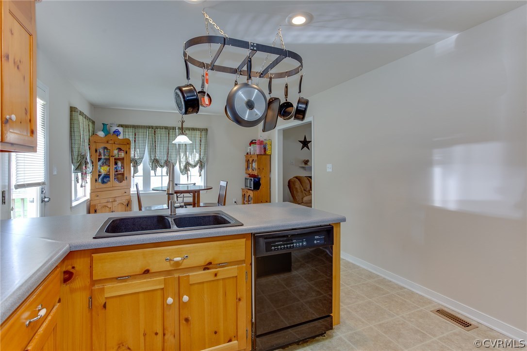 11406 Corte Castle Road Chesterfield, VA 23838 - Photo 27 of 38 a kitchen with stainless steel appliances granite countertop a stove and cabinets