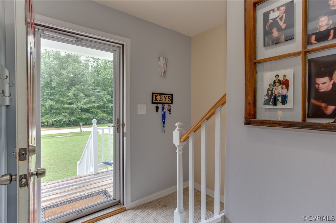 11406 Corte Castle Road Chesterfield, VA 23838 - Photo 29 of 38 a view of a hallway with a flower pot next to a window