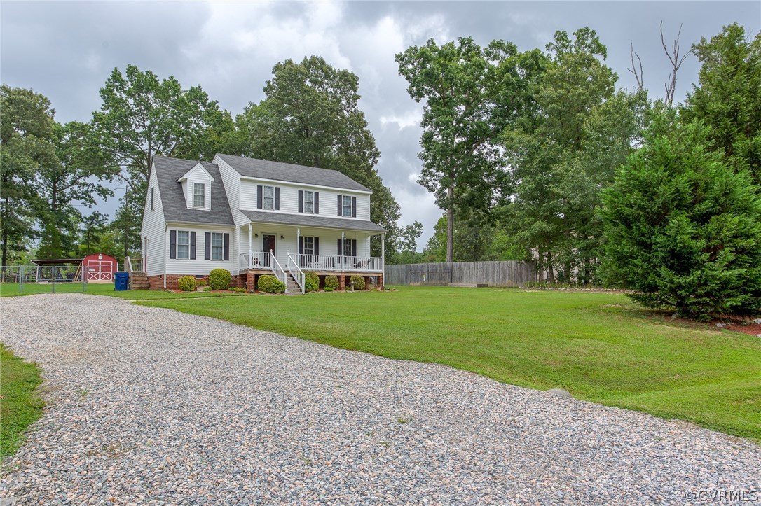 11406 Corte Castle Road Chesterfield, VA 23838 - Photo 3 of 38 a front view of a house with a yard