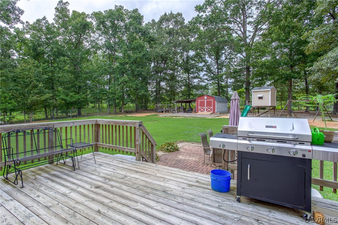 11406 Corte Castle Road Chesterfield, VA 23838 - Photo 8 of 38 a view of a deck with chair and wooden floor