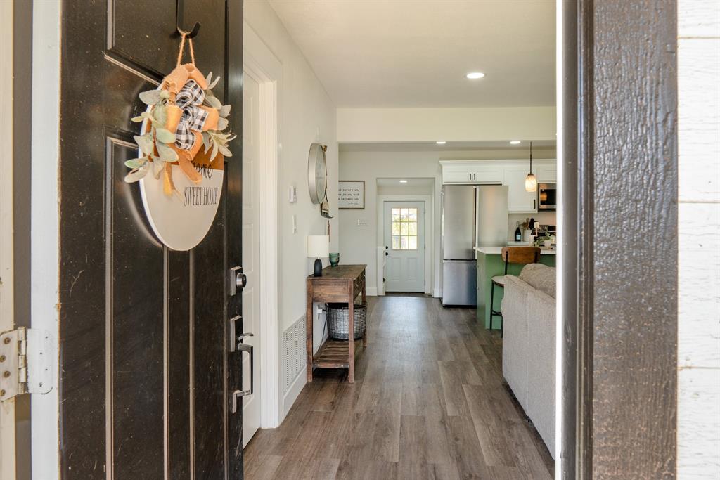 205 Oregon Avenue Azle, TX 76020 - Photo 5 of 40 Entryway featuring dark wood-style floors and recessed lighting