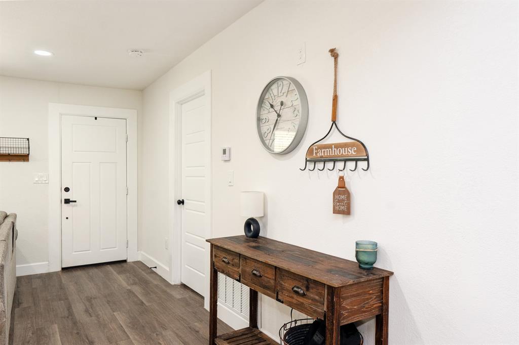 205 Oregon Avenue Azle, TX 76020 - Photo 6 of 40 Entrance foyer with dark wood-style floors and recessed lighting